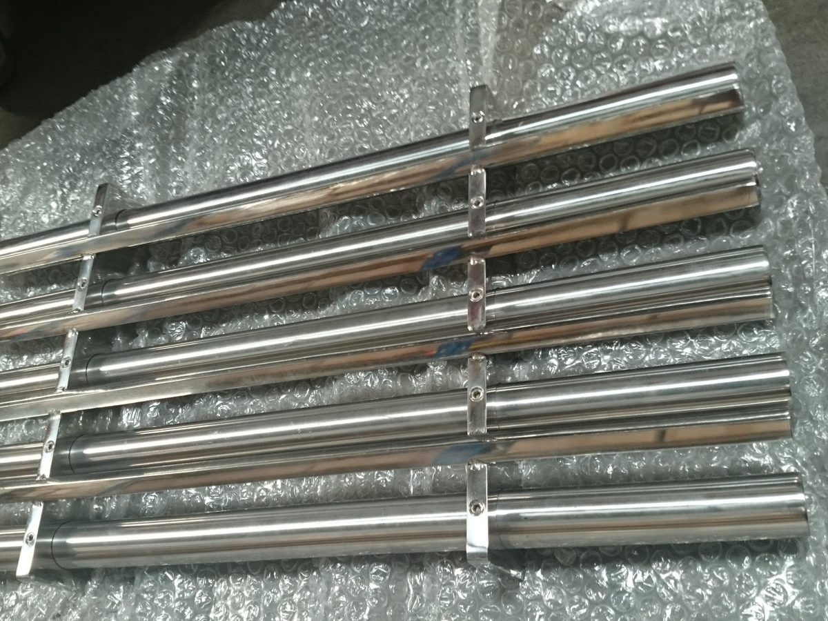 Large grate magnet with thick polished stainless steel magnetic bars held in a cross frame